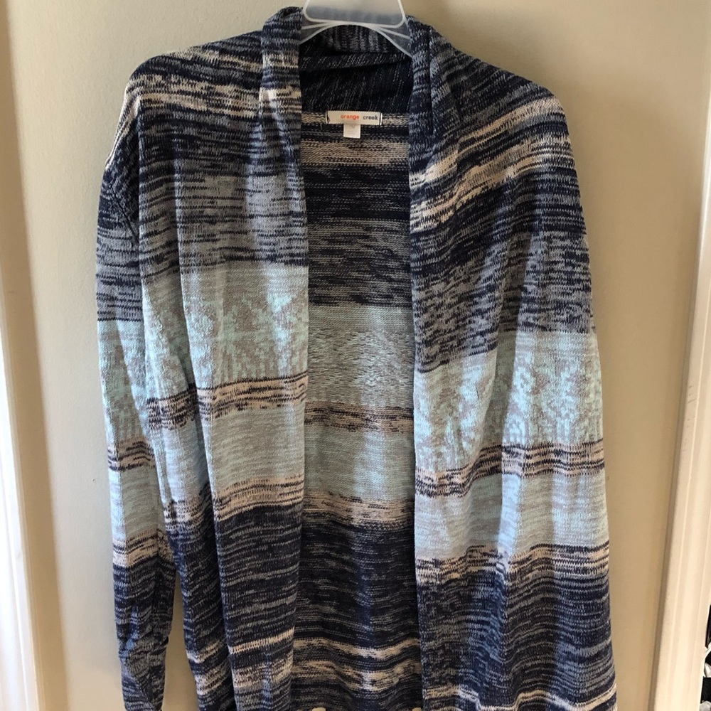Orange Creek brand baby blue and ivory sweater
